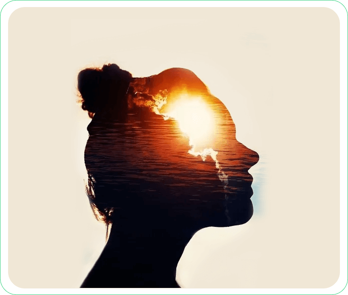 A woman 's head with the sun shining through it.